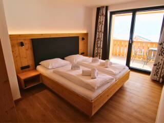 11 v2. Catered chalet Elfriede Fiss Slaapkamer Apartment G