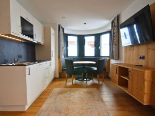 28. Catered chalet Elfriede Fiss Woonkamer Apartment G